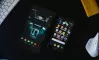 A collection of mobile devices showing different stages of app development, from wireframe to finished product.