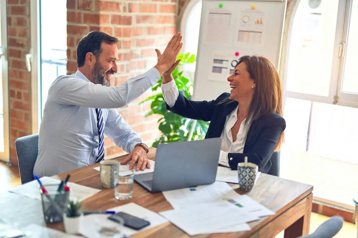 business success, people high fiving